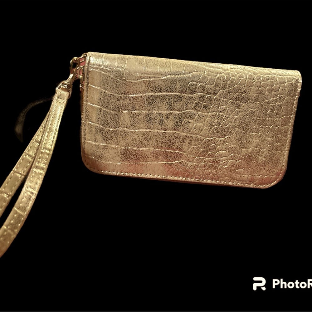 Metalic gold wristlet.